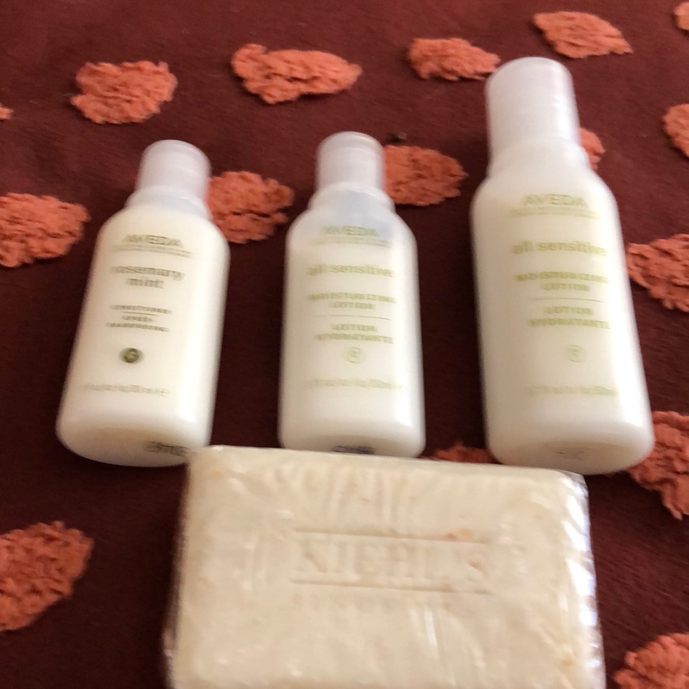 A Aveda moisture lotion Kiehls bar soap and rosemary shampoo conditioner